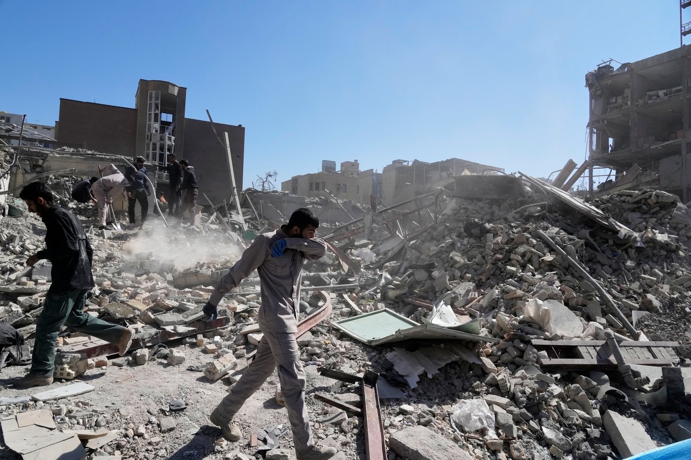 Photos show rubble and mourning in Iran's capital after US and Israeli airstrikes | iNFOnews.ca
