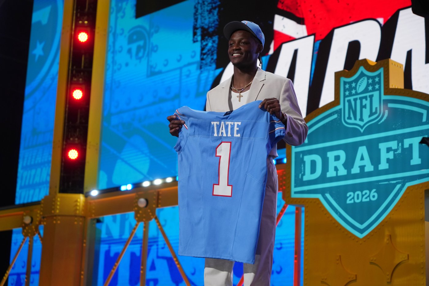 The Titans take receiver Carnell Tate at No. 4, trade up for edge rusher Keldric Faulk | iNFOnews.ca