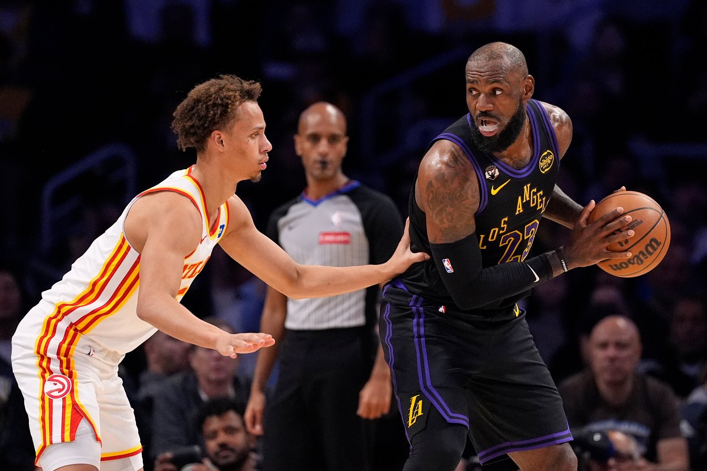 LeBron barely misses triple-double, Luka adds 27 in Lakers' skid-snapping 141-116 win over Hawks | iNFOnews.ca