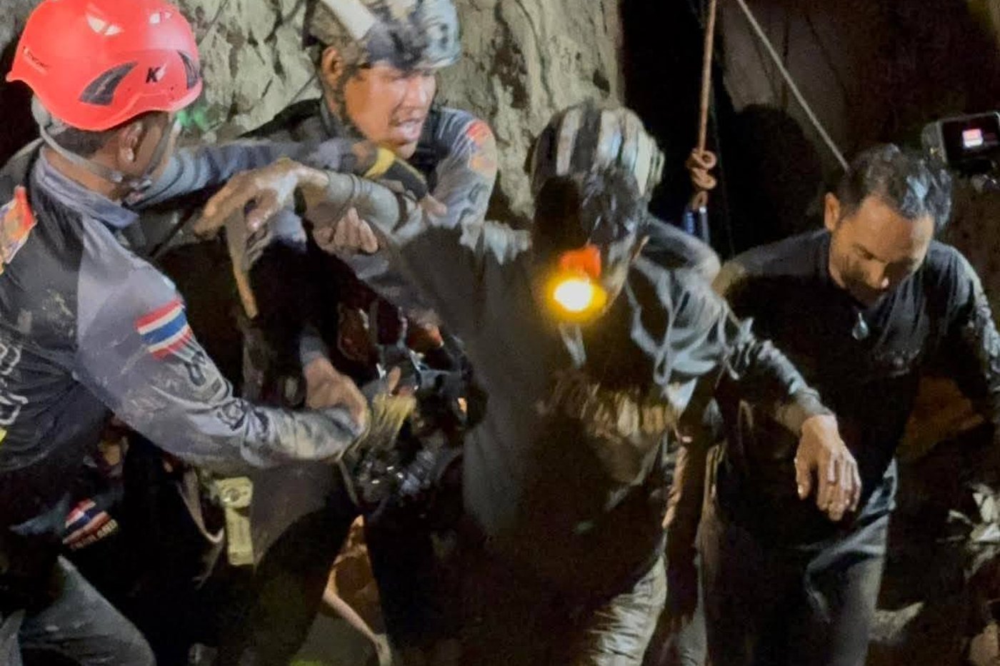 Rescuers search for alternative route to reach 2 missing in a flooded Laos cave | iNFOnews.ca
