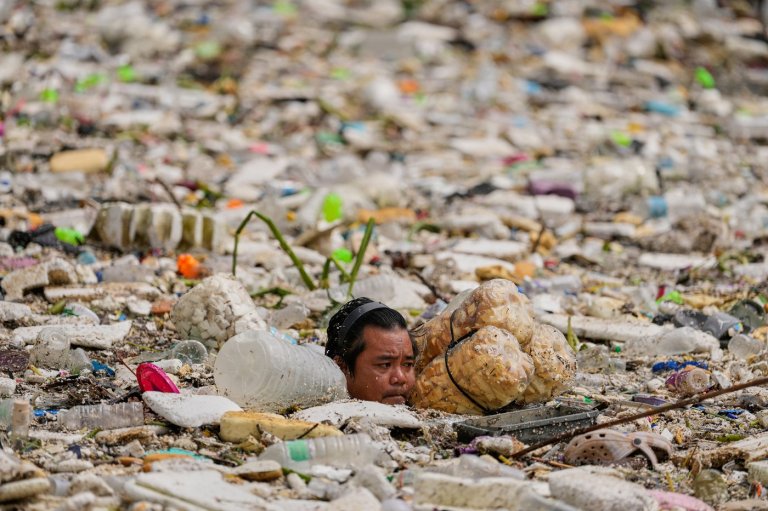 Photos show flooding and storm damage in the Philippines | iNFOnews.ca