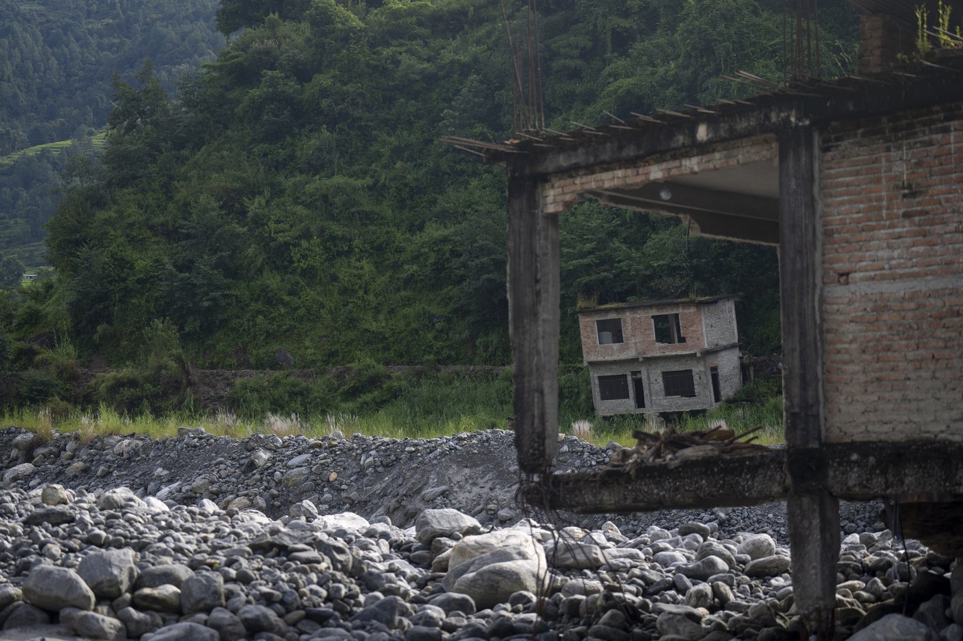 AP PHOTOS: Cascading disasters push residents of a Nepalese valley to the brink | iNFOnews.ca