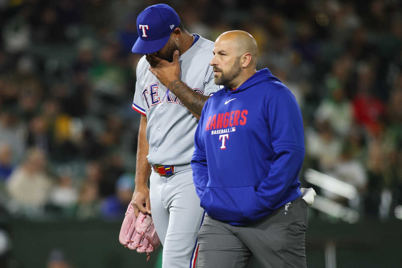 Rangers reliever Luis Curvelo hurt while delivering a wild pitch against the Athletics | iNFOnews.ca