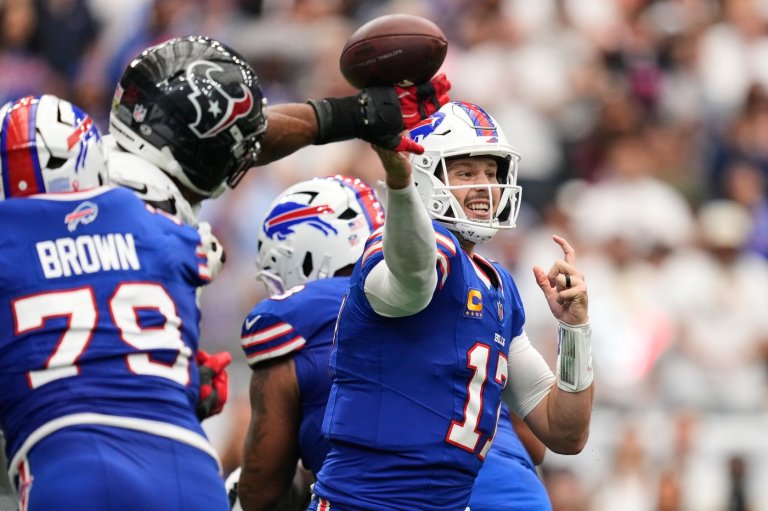 Josh Allen connects with Joshua Palmer for a late TD and Bills beat Texans 36-31 in wild opener | iNFOnews.ca