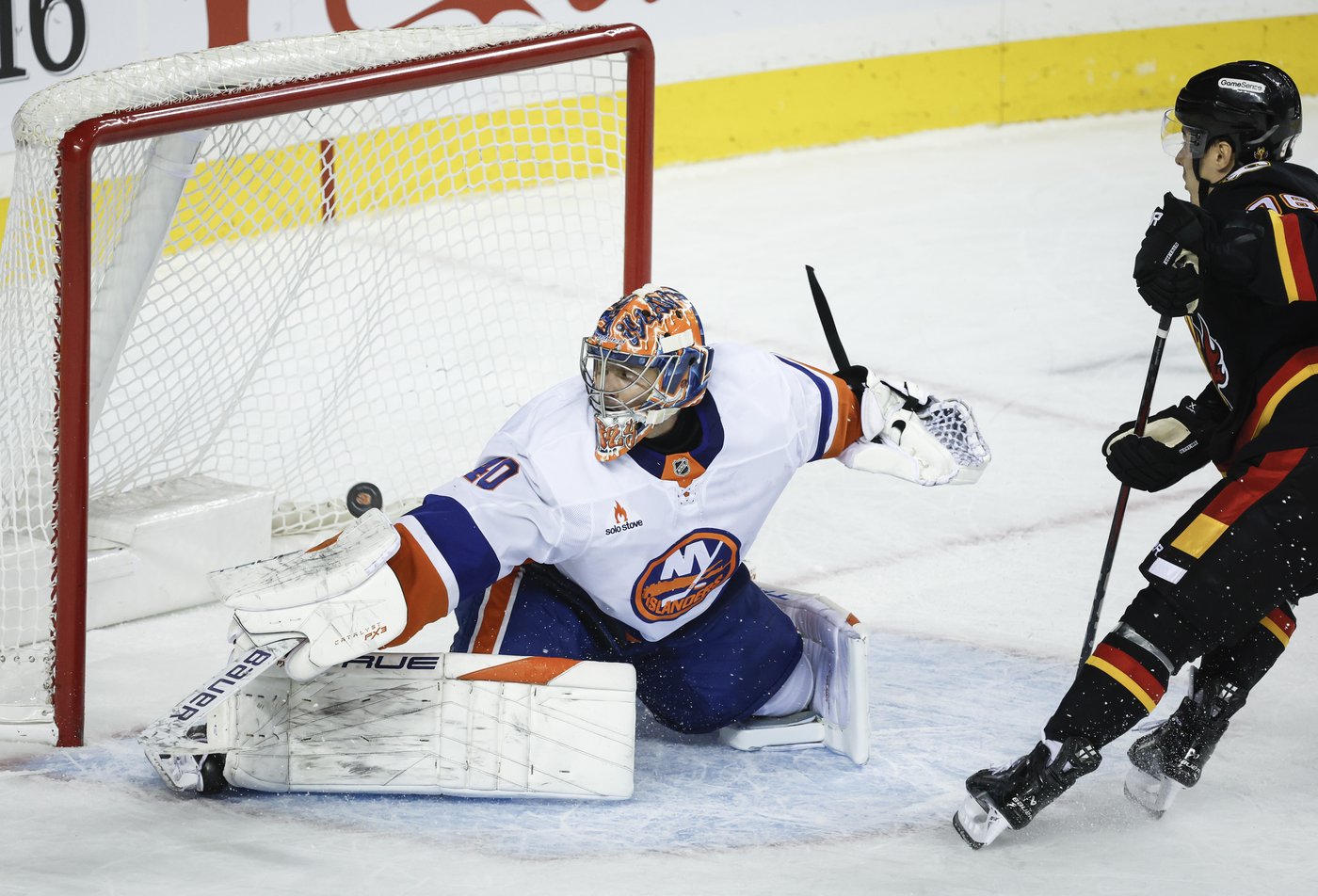 Dustin Wolf solid as Flames hang on for 2-1 shootout win over Islanders | iNFOnews.ca