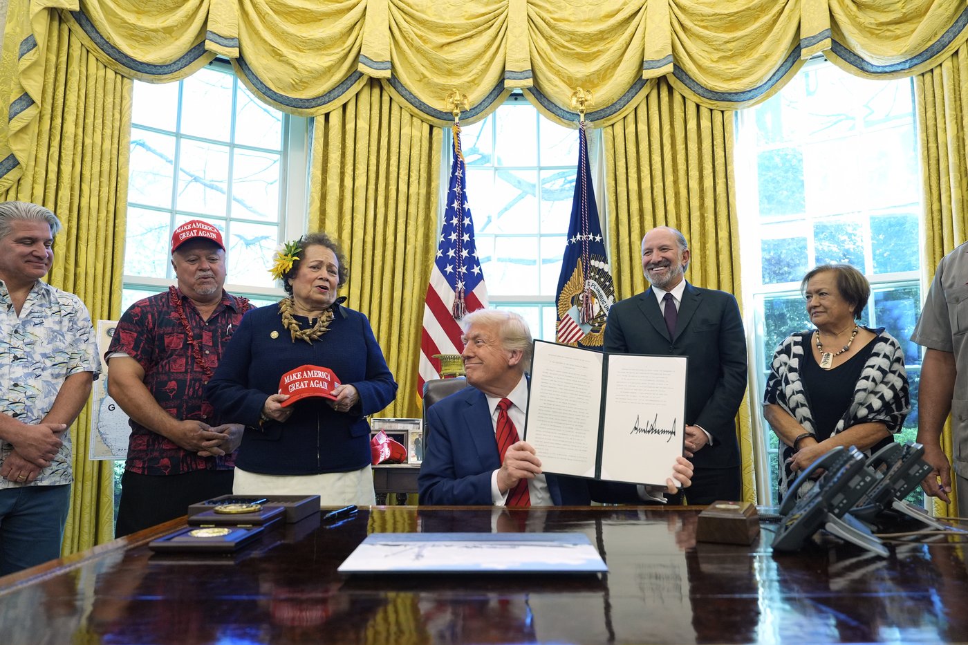 The Latest: Trump says trade deals could be done within a month | iNFOnews.ca