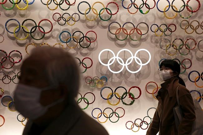 Tokyo organizers, government take offensive on virus threat | iNFOnews.ca