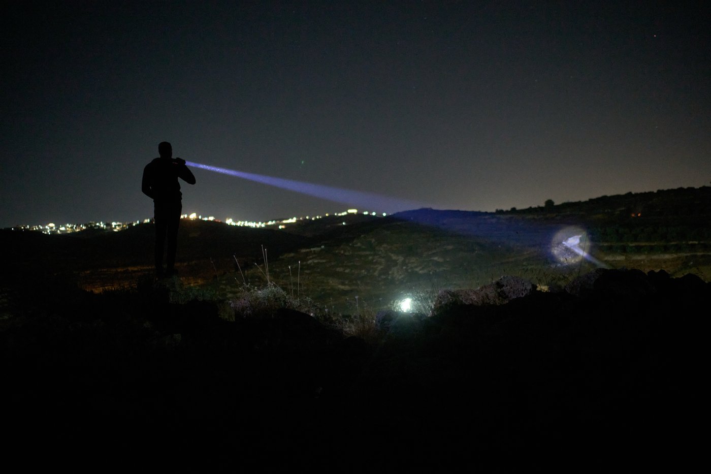 Photos show West Bank Palestinians keeping watch at night as settler violence grows | iNFOnews.ca