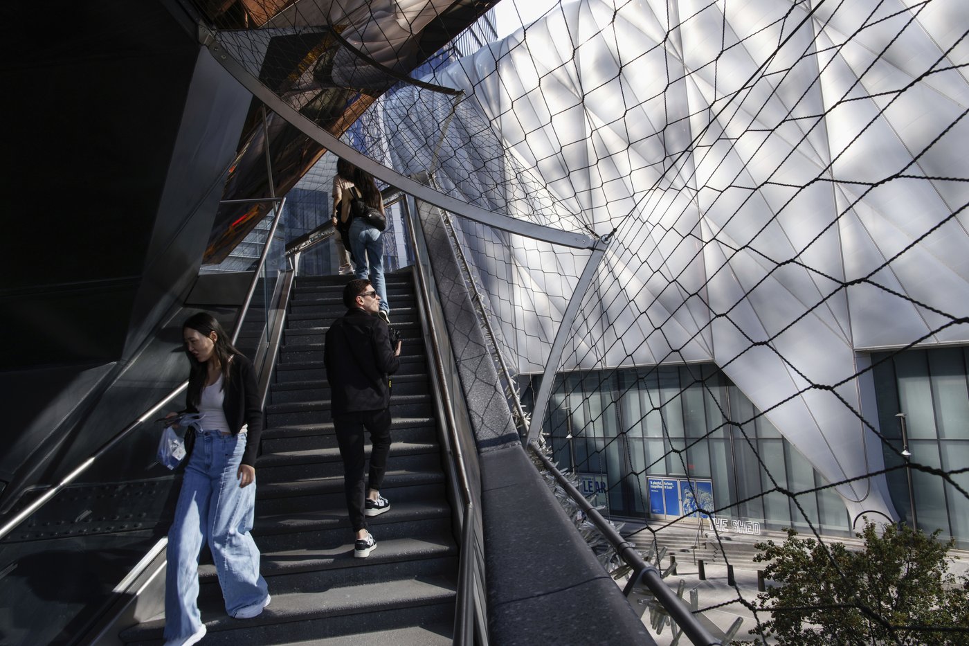 Tourists return to NYC's Vessel sculpture after it reopens with netting to prevent deaths | iNFOnews.ca