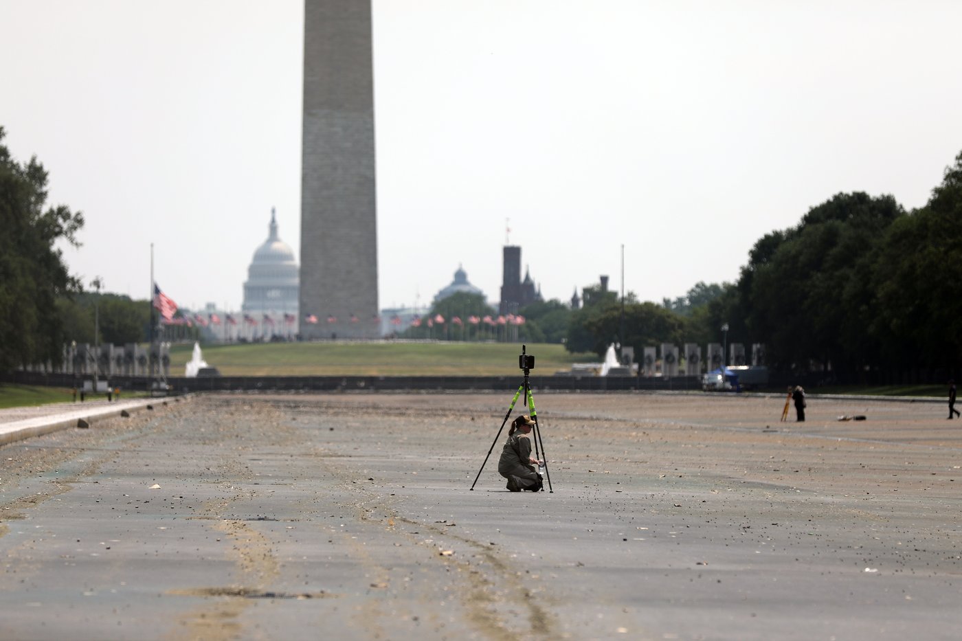 Drained Reflecting Pool reveals Trump's 'American flag blue' liner is now closer to gray | iNFOnews.ca