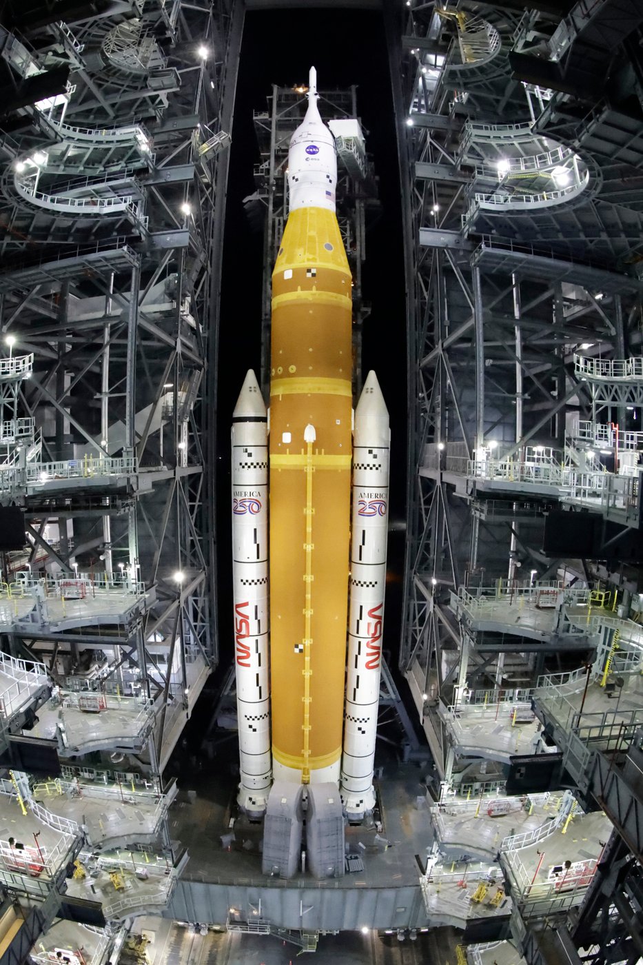 NASA hauls its repaired moon rocket from the hangar back to the pad for an early April launch | iNFOnews.ca