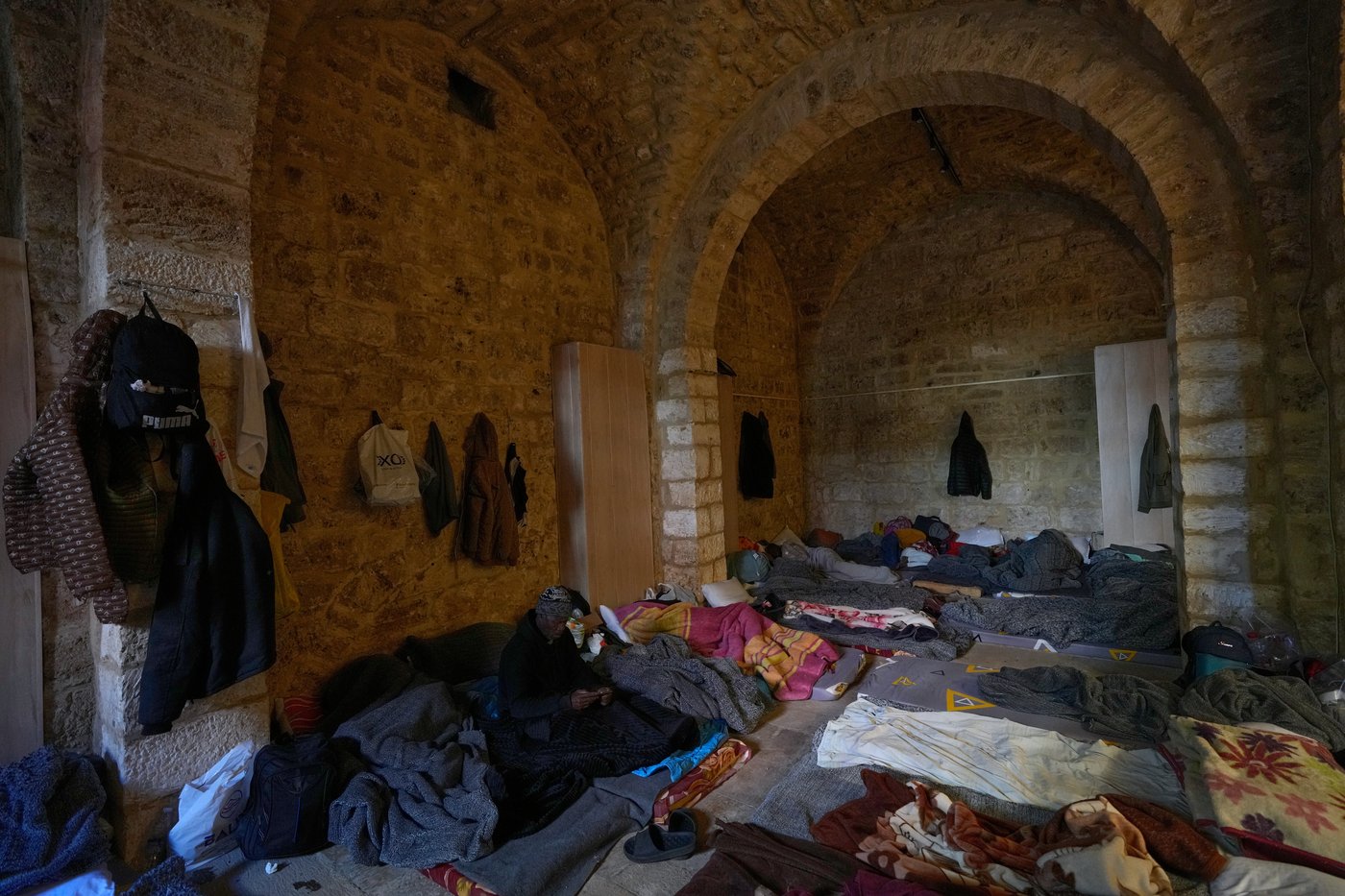 Photos of displaced civilians in Lebanon, where schools and stadiums turn into shelters during war | iNFOnews.ca