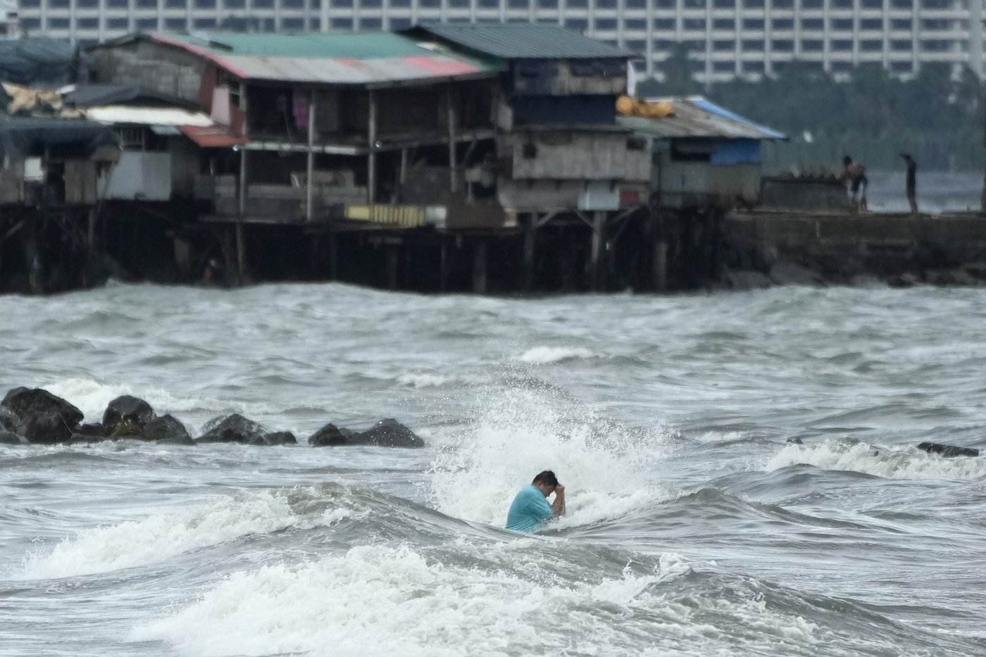 Floods in Philippines kill at least 9 and trap others on roofs as storm approaches | iNFOnews.ca