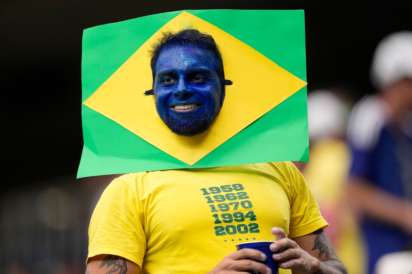 World Cup fans flood stadiums and fan zones with dazzling costumes, facepaint and flags - in photos | iNFOnews.ca