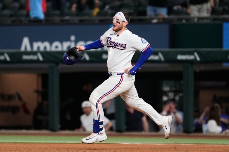 No closing this game as Rangers beat Dbacks after frantic 9th inning and Jansen's walk-off hit | iNFOnews.ca