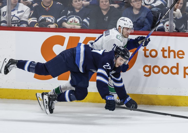 Morrissey scores in OT as Jets slip past Canucks 3-2 | iNFOnews.ca