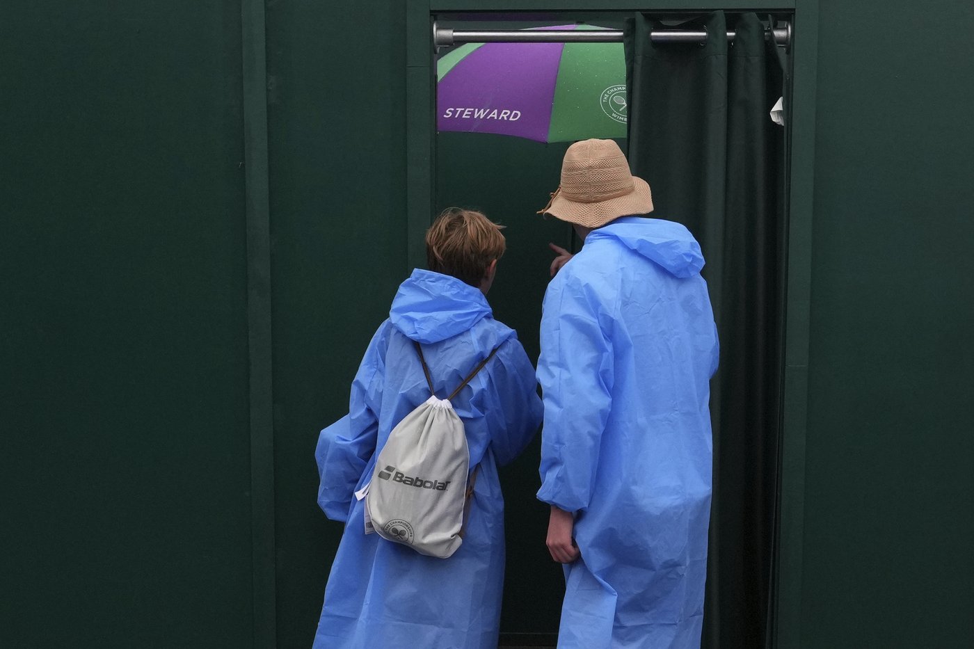 Photos show the rain on Day 3 after the Wimbledon heatwave | iNFOnews.ca
