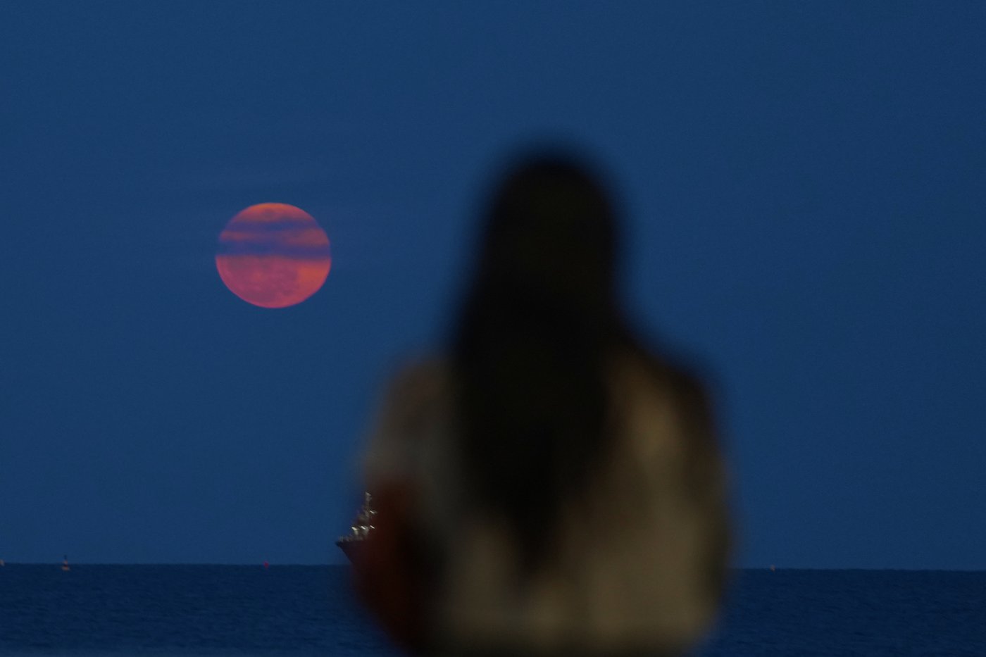 Photos of a blood-red moon and total lunar eclipse | iNFOnews.ca
