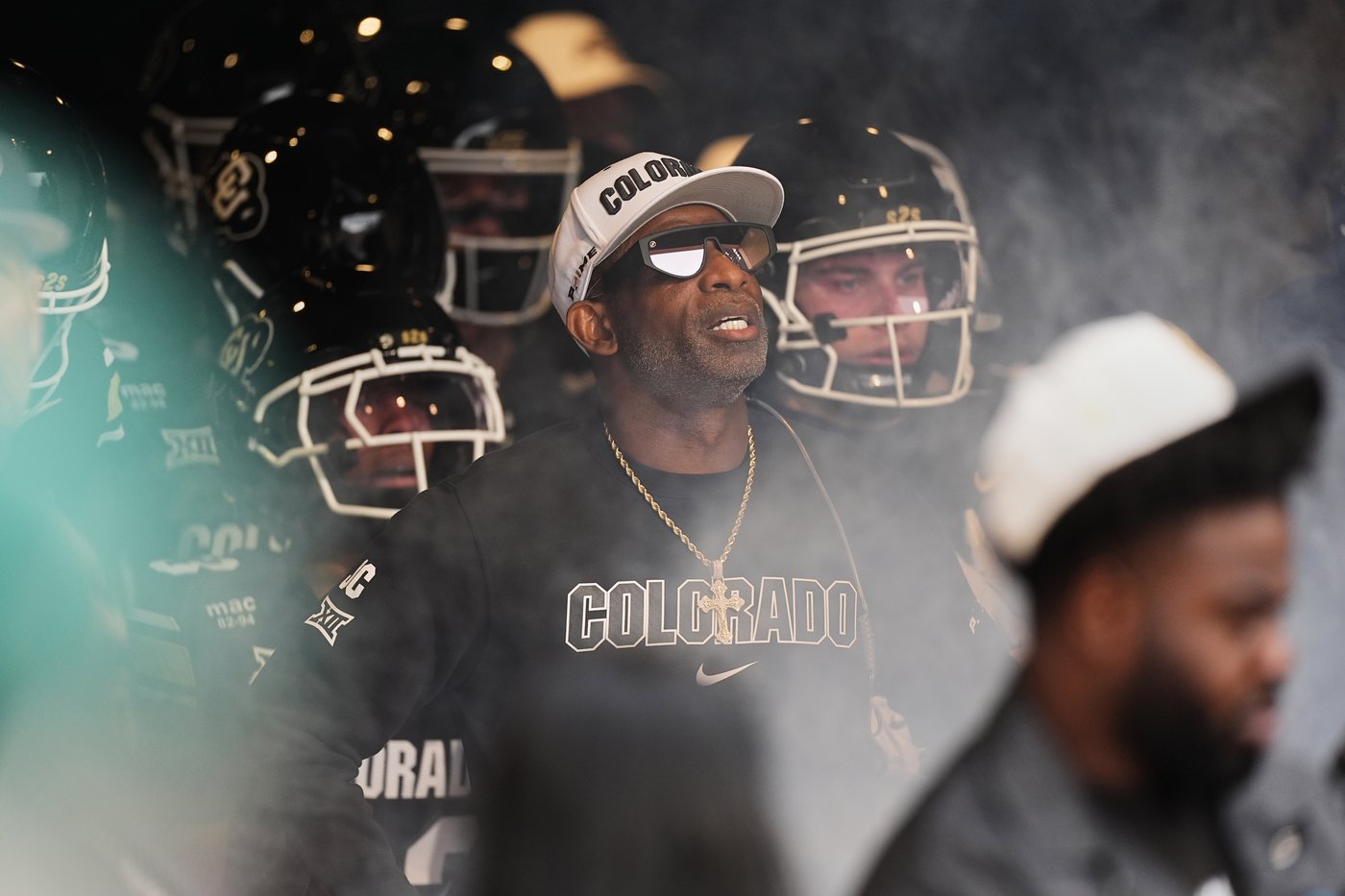 Colorado fans storm field after win over No. 22 Iowa State, Deion Sanders loves it but fine may loom | iNFOnews.ca