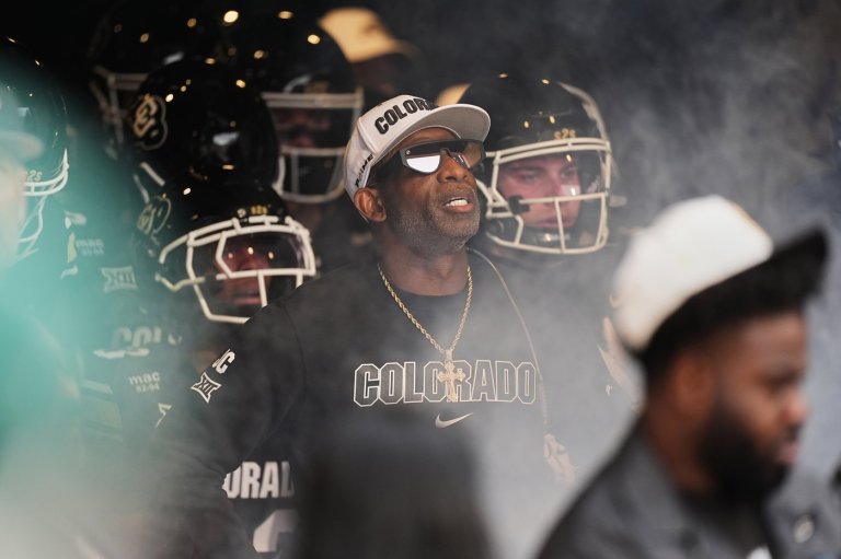 Colorado fans storm field after win over No. 22 Iowa State, Deion Sanders loves it but fine may loom | iNFOnews.ca