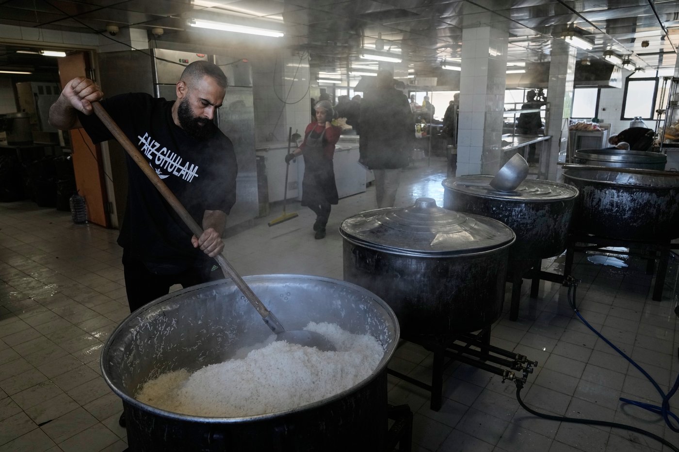 Photos of displaced civilians in Lebanon, where schools and stadiums turn into shelters during war | iNFOnews.ca
