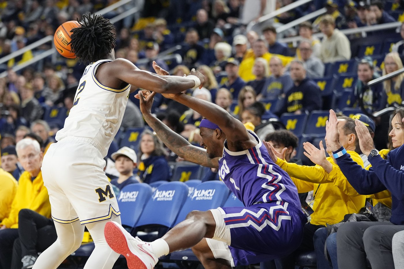 Nimari Burnett scores 16 and Danny Wolf secures a double-double to lead Michigan past TCU 76-64 | iNFOnews.ca