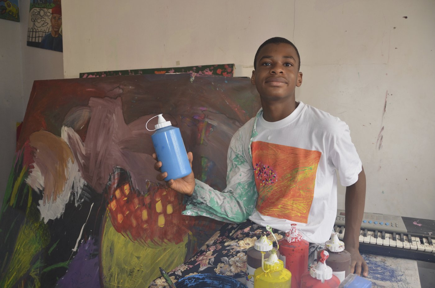 Nigerian teenager sets world painting record with canvas that's bigger than a soccer field | iNFOnews.ca Nigerian teenager sets world painting record with canvas that's bigger than a soccer field | iNFOnews.ca