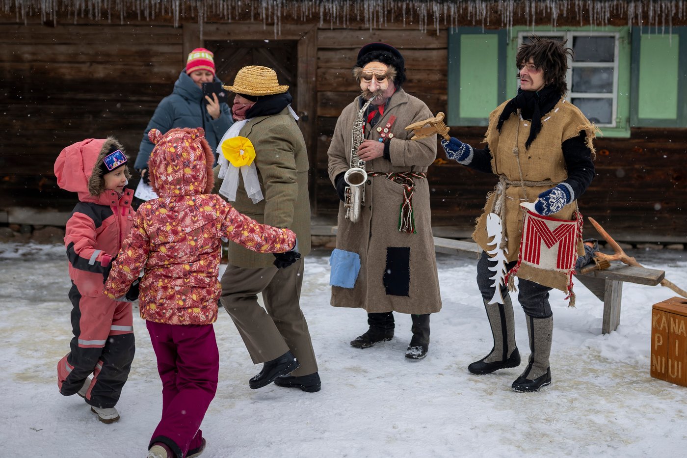 Photos show masked revelers celebrating Shrovetide in Lithuania | iNFOnews.ca