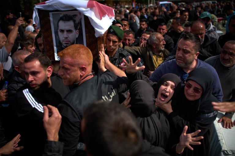 Lebanese bury 13 officers killed by Israel as grief and rage surge ahead of talks in the US | iNFOnews.ca