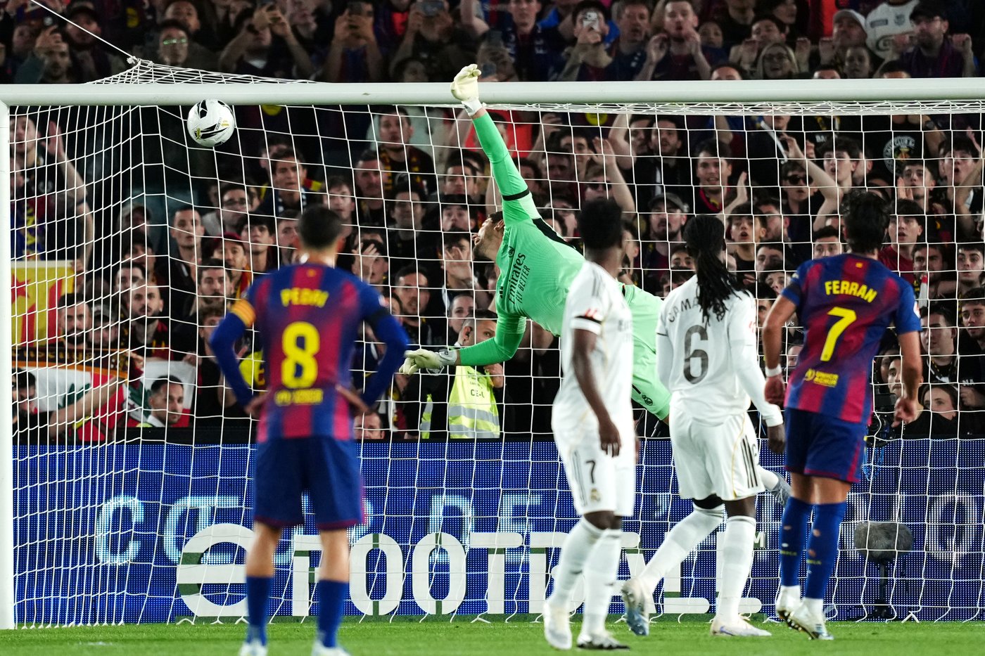 Watched by its grieving coach, Barcelona retains Spanish league title by beating rival Real Madrid | iNFOnews.ca Watched by its grieving coach, Barcelona retains Spanish league title by beating rival Real Madrid | iNFOnews.ca
