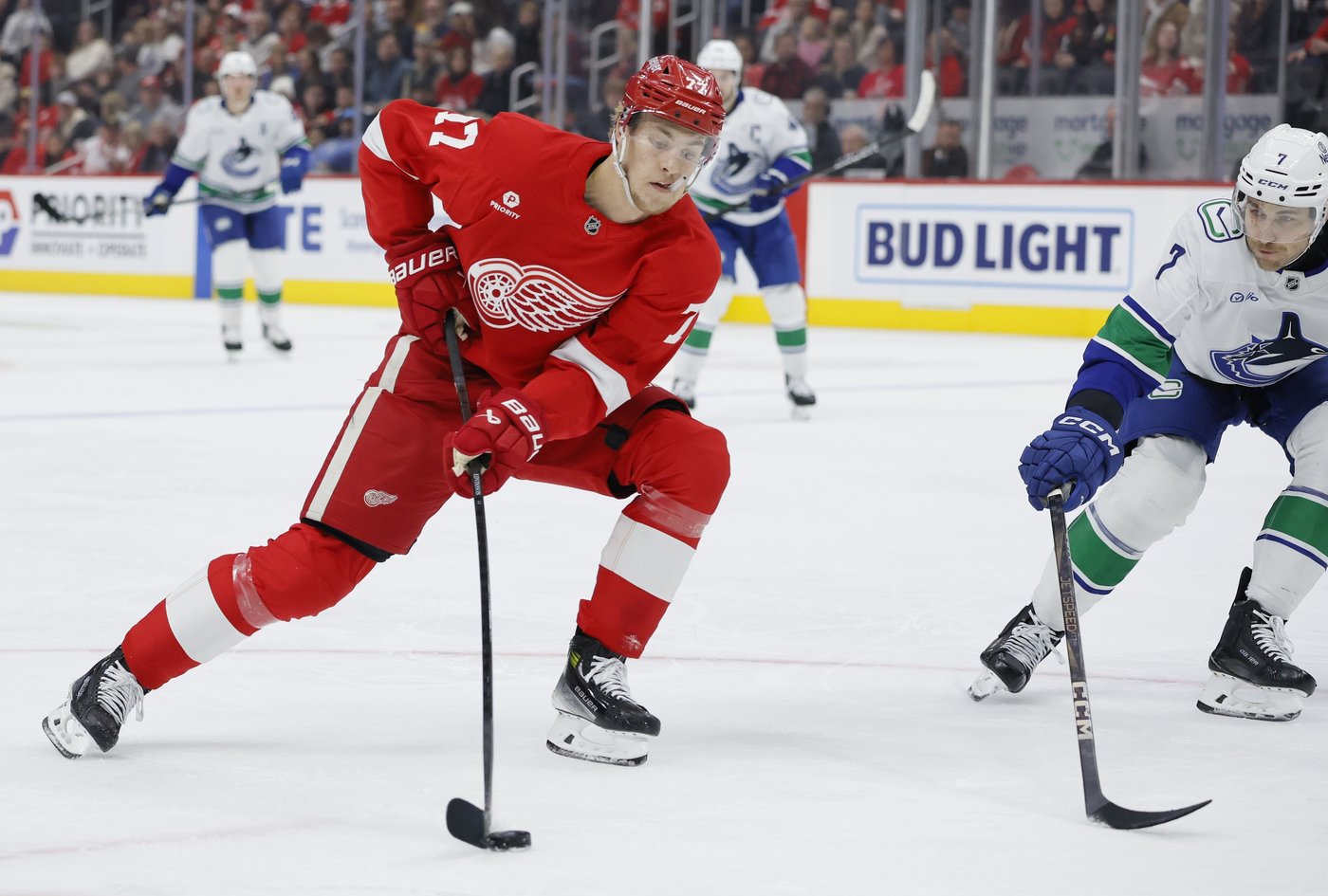 Jake DeBrusk scores hat trick, including OT game-winner, as Canucks top Red Wings 5-4 | iNFOnews.ca