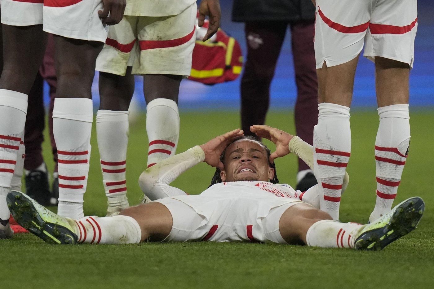 Leipzig's Xavi Simons helped off the field with injury in Champions League | iNFOnews.ca