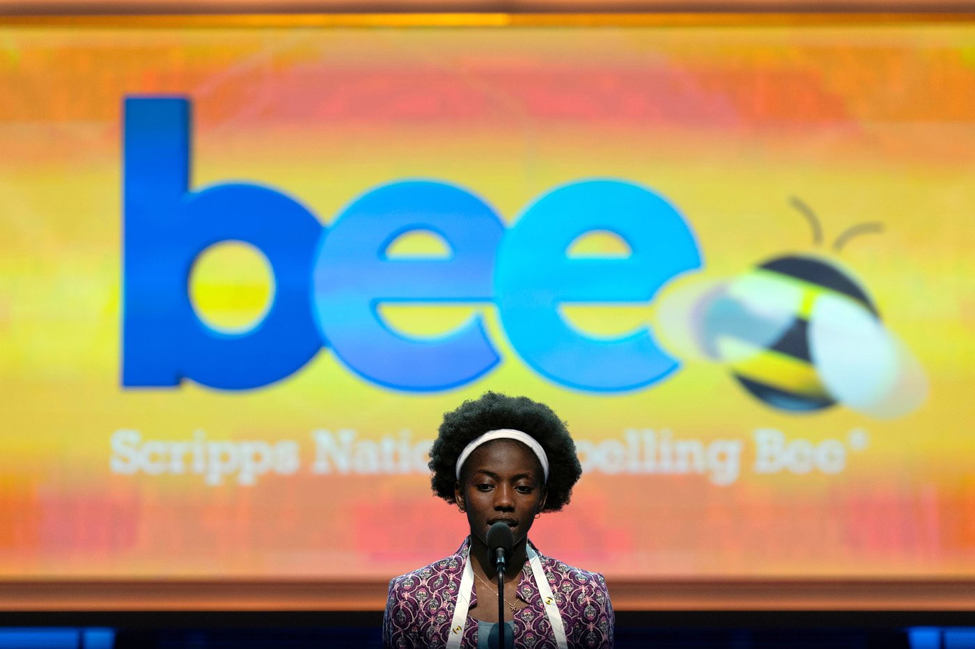 Photos of students competing for the Scripps National Spelling Bee trophy | iNFOnews.ca