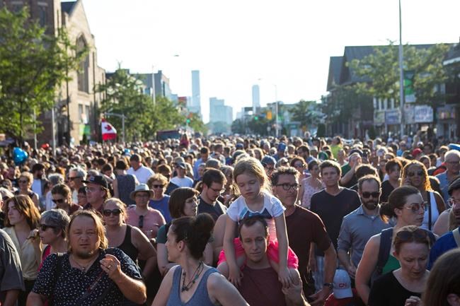 Hundreds pack Toronto's Greektown neighbourhood for shooting vigil | iNFOnews.ca