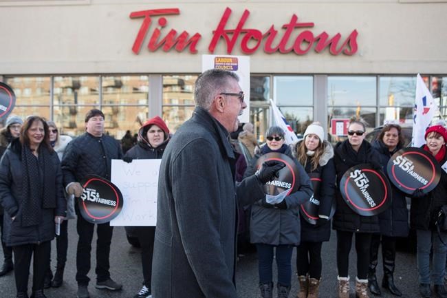 'Hold the sugar, hold the cream, Tim Hortons don't be mean,' protesters chant | iNFOnews.ca 'Hold the sugar, hold the cream, Tim Hortons don't be mean,' protesters chant | iNFOnews.ca