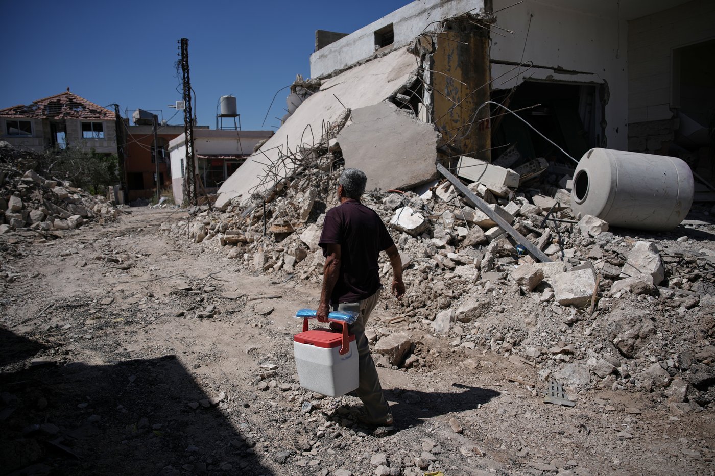 Residents return to a southern Lebanese village after a US-brokered agreement, in photos | iNwheels