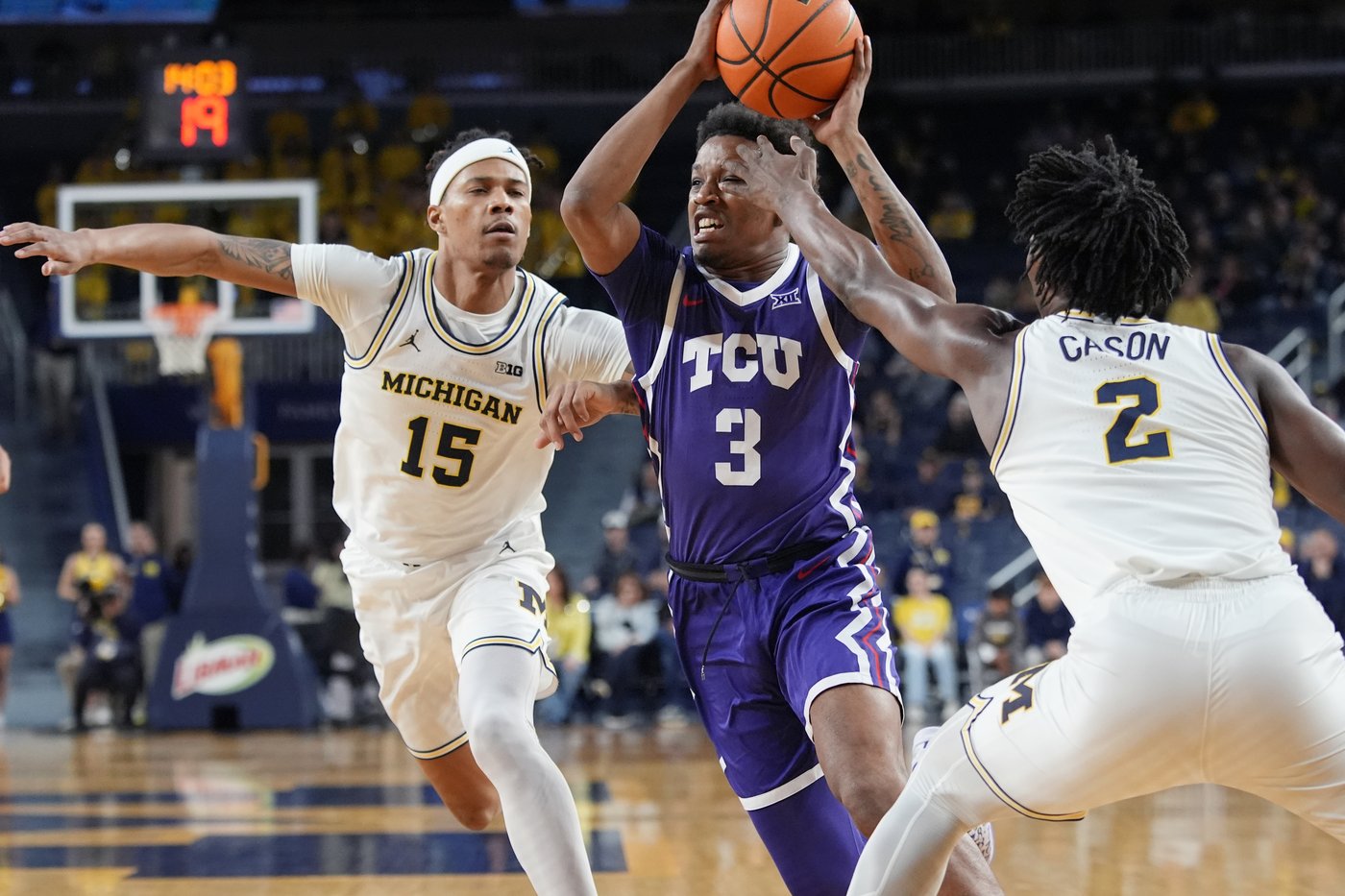 Nimari Burnett scores 16 and Danny Wolf secures a double-double to lead Michigan past TCU 76-64 | iNFOnews.ca