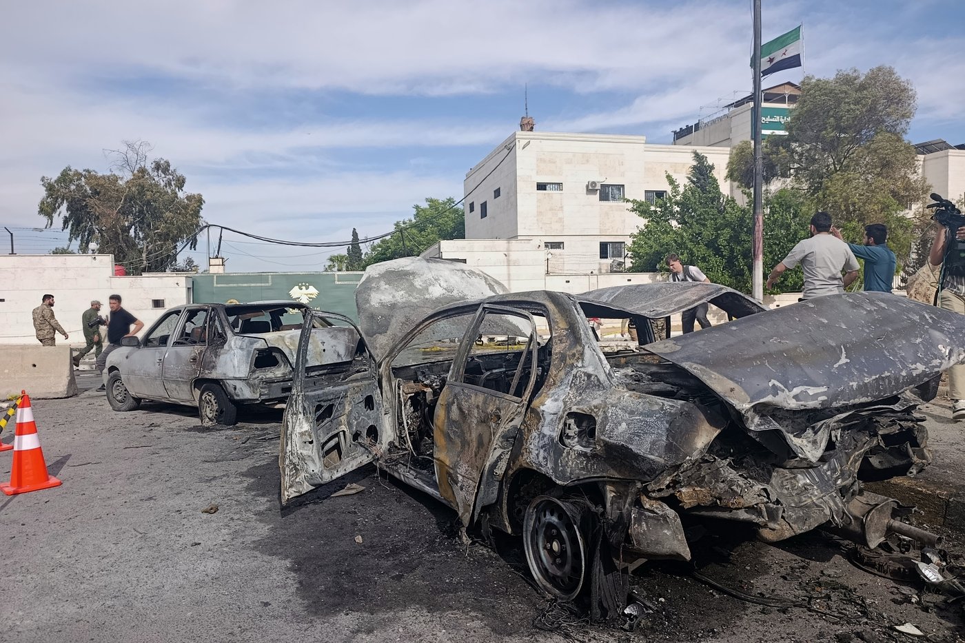 Blast outside a Syrian defense ministry building kills a soldier, wounds 12 people | iNFOnews.ca