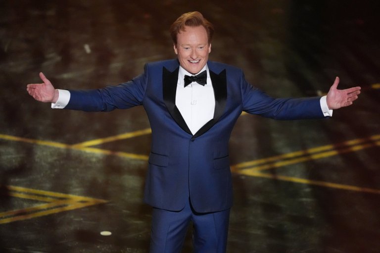 Conan O'Brien plays Aunt Gladys and takes opening shots at AI and Chalamet to open 2026 Oscars | iNFOnews.ca