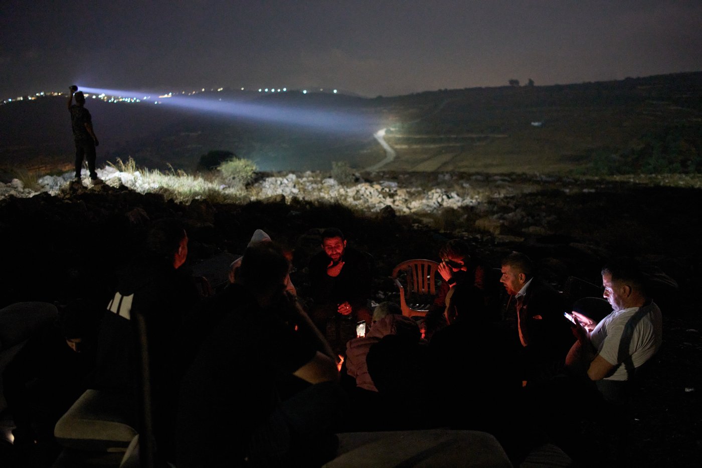 Photos show West Bank Palestinians keeping watch at night as settler violence grows | iNFOnews.ca