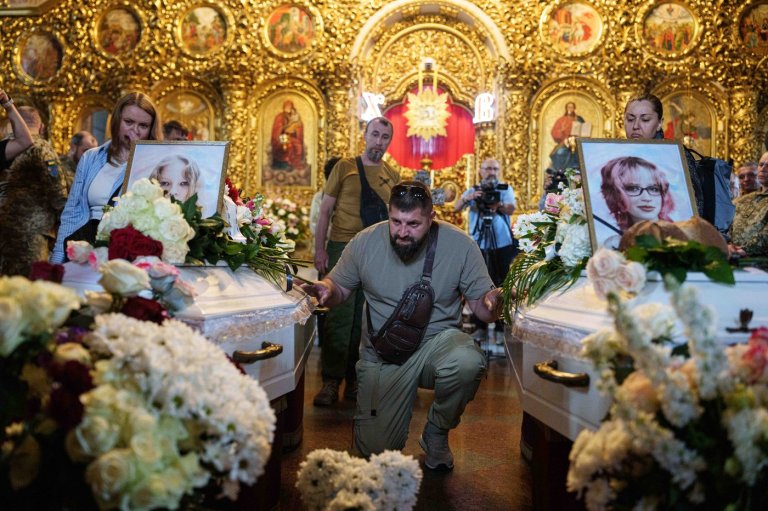 Kyiv holds a funeral for 2 young sisters killed by a Russian missile strike | iNFOnews.ca