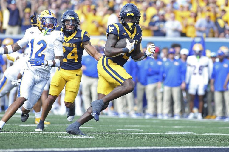 Edwards' short TD run in overtime leads West Virginia over Pittsburgh 31-24 in the Backyard Brawl | iNFOnews.ca