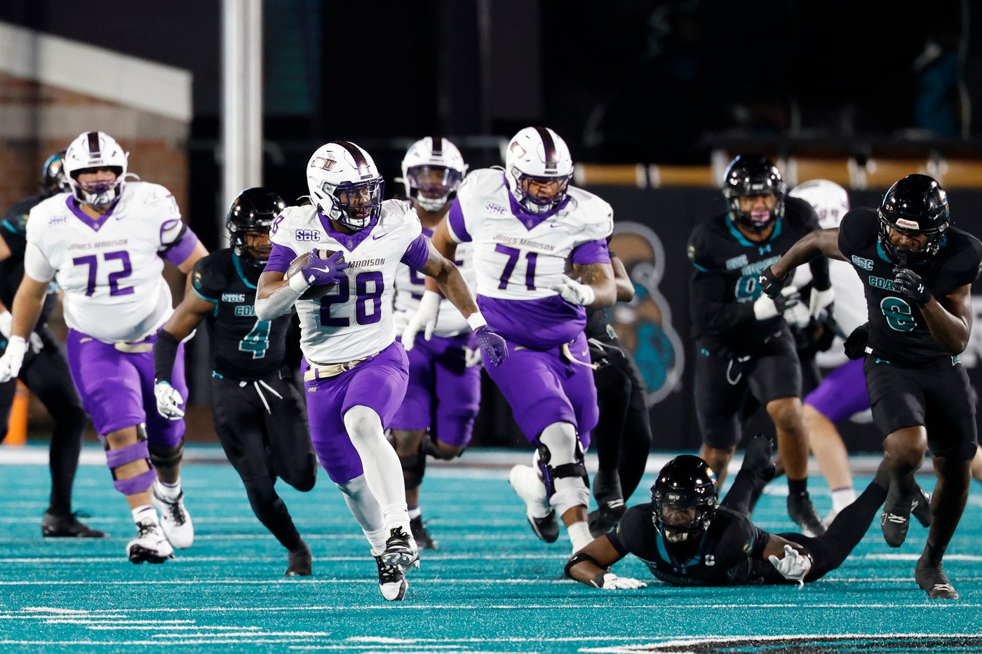 No. 20 James Madison routs Coastal Carolina 59-10 to complete perfect Sun Belt regular season | iNFOnews.ca