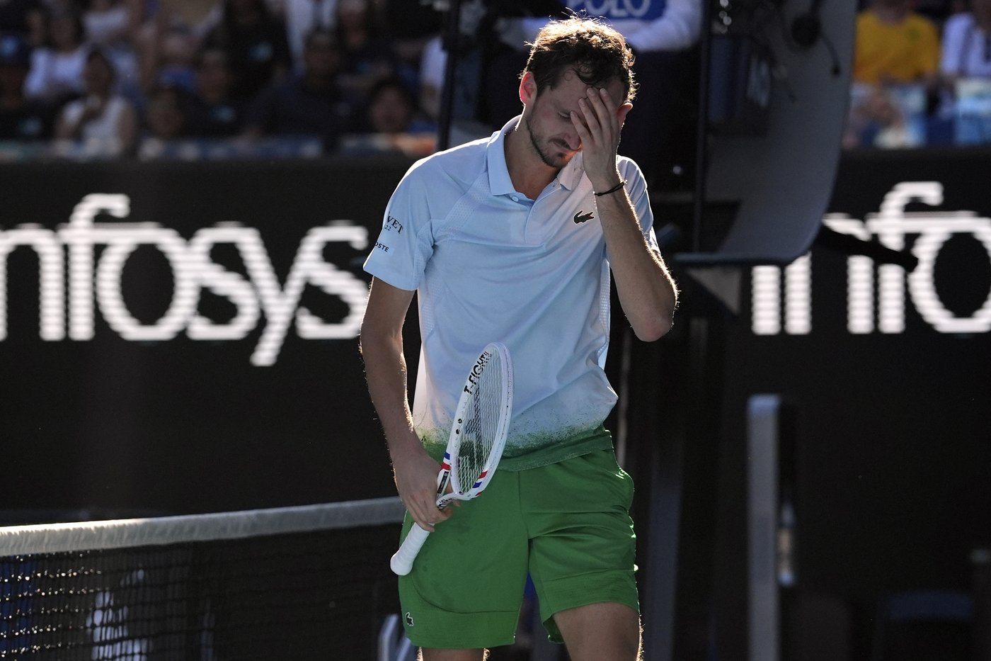 Daniil Medvedev destroys a TV camera attached to the net during his 5-set Australian Open win | iNFOnews.ca