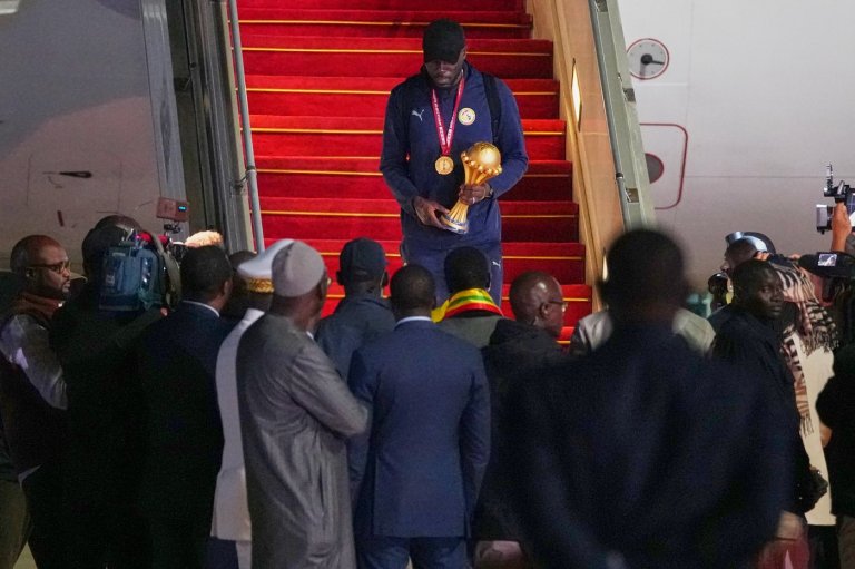Senegal President greets team as triumphant players receive heroes welcome in Dakar | iNFOnews.ca