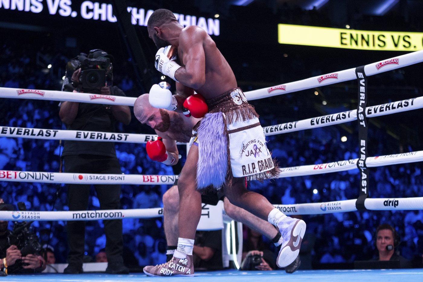 'Boots' Ennis defends welterweight championship with unanimous decision win over Chukhadzhian | iNFOnews.ca 'Boots' Ennis defends welterweight championship with unanimous decision win over Chukhadzhian | iNFOnews.ca