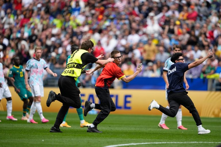 Three people run onto field and stop play during the World Cup match between Belgium and Senegal | iNFOnews.ca