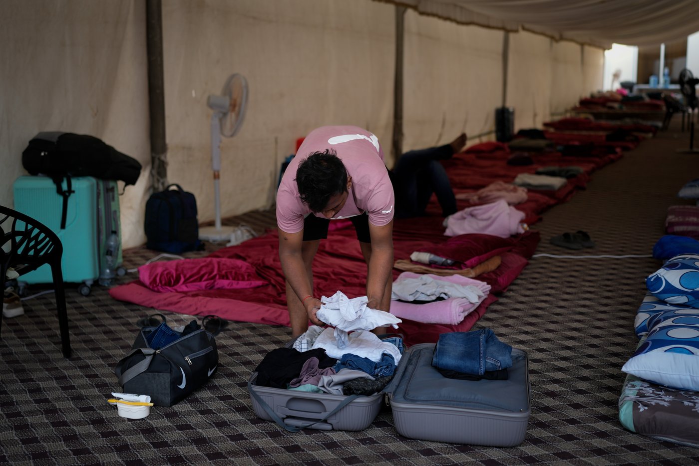 Photos show travellers stuck in the UAE taking shelter from war at Indian expat's home | iNFOnews.ca