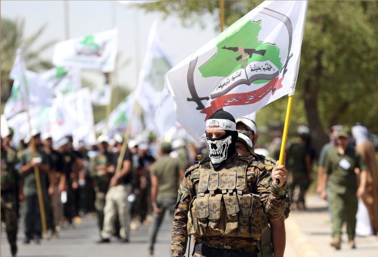 Powerful Iran-backed Iraqi militia says it will start handing its weapons to the state | iNFOnews.ca