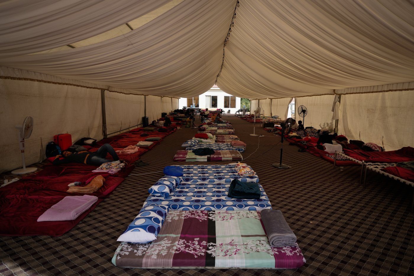 Photos show travellers stuck in the UAE taking shelter from war at Indian expat's home | iNFOnews.ca